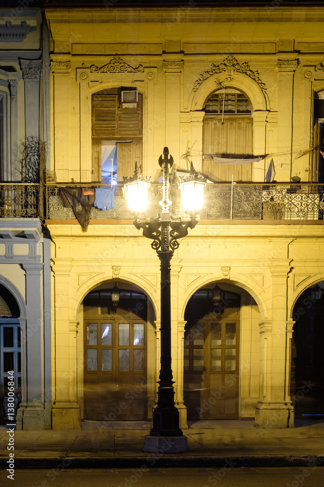 Old buildings in downtown Havana illuminated at night