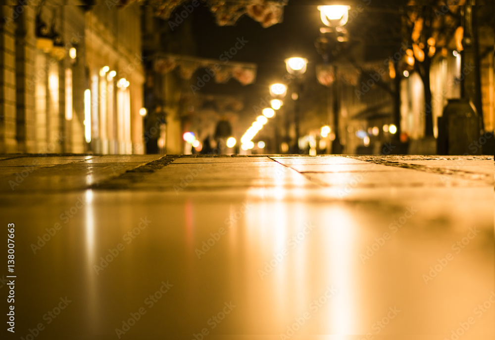 Blurred background. Blurred night a city street.