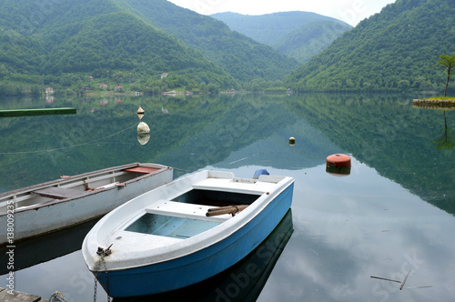 Natural landscape with lake and boat