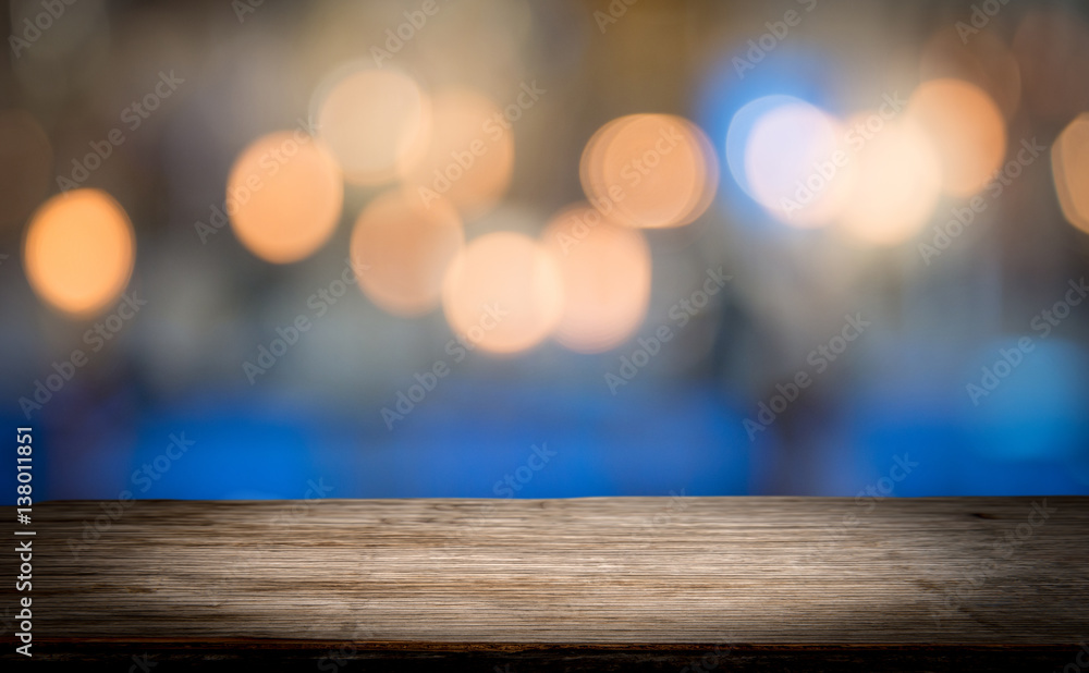 Wood table top on shiny bokeh gold background, vintage tone - can be used for display or montage your products