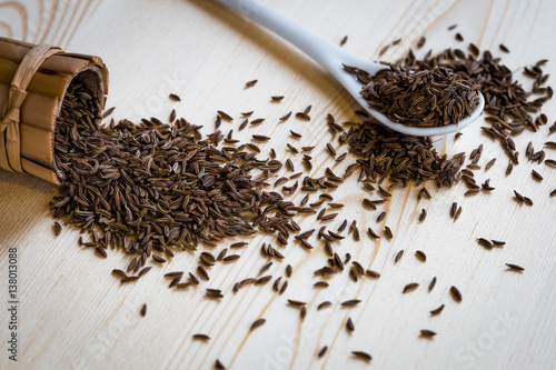 raw caraway seeds on table