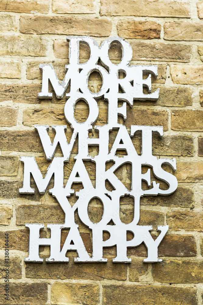 Do More Of What Makes You Happy Motivation Quote on a wall Do More Of What Makes You Happy Motivation Quote on a wall