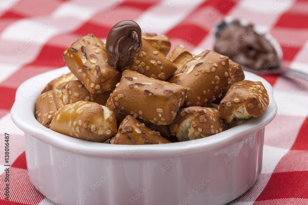 Pretzels and chocolate frosting. Pretzels and chocolate frosting.