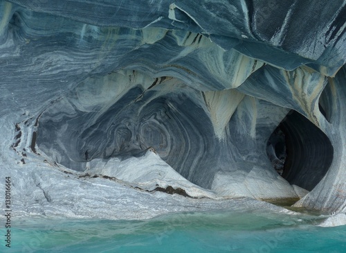 Unique colors and patterns on the Marble cliffs and cavers eroded by the turquoise waters of Lago General Carrera.