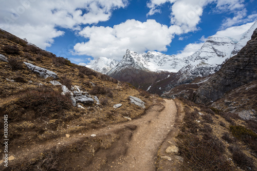 Mountain trail in Yading-China. Path along the ridge leading to summit