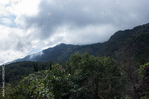 Standing on top of mountain to see this landscape view