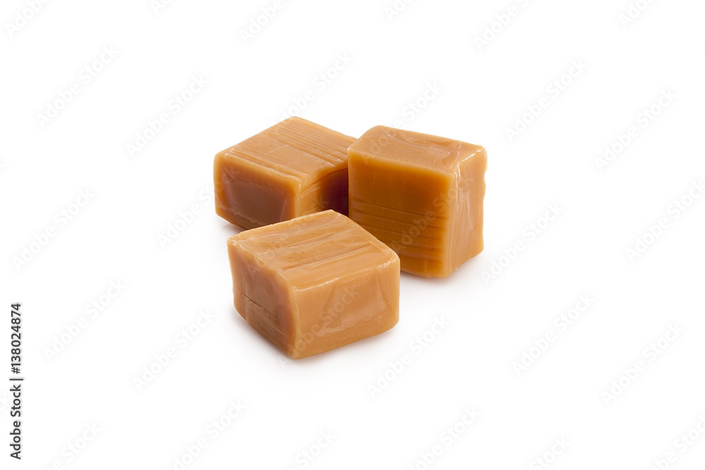 Caramels on white StockFoto Adobe Stock