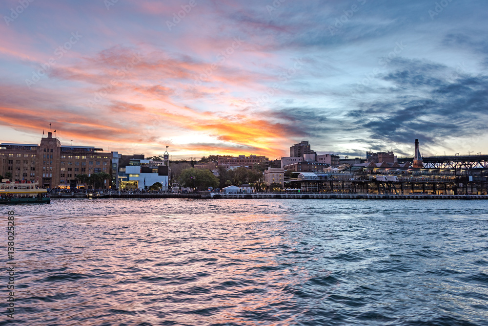 Sydney Harbour with picturesque sunset sky on the background
