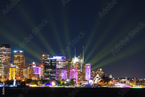 Photography Sydney cityscape at night with colorful lights illuminating skyline