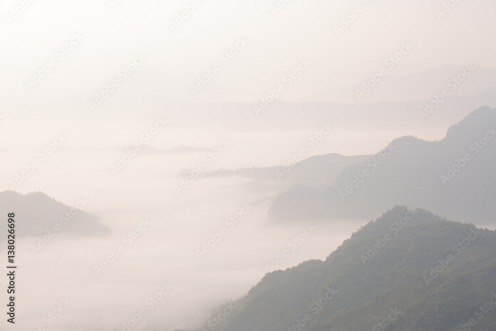 Sunrise scene with the peak of mountain and cloudscape at Phu chi fa in Chiangrai,Thailand Sunrise scene with the peak of mountain and cloudscape at Phu chi fa in Chiangrai,Thailand