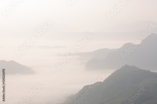 Sunrise scene with the peak of mountain and cloudscape at Phu chi fa in Chiangrai,Thailand