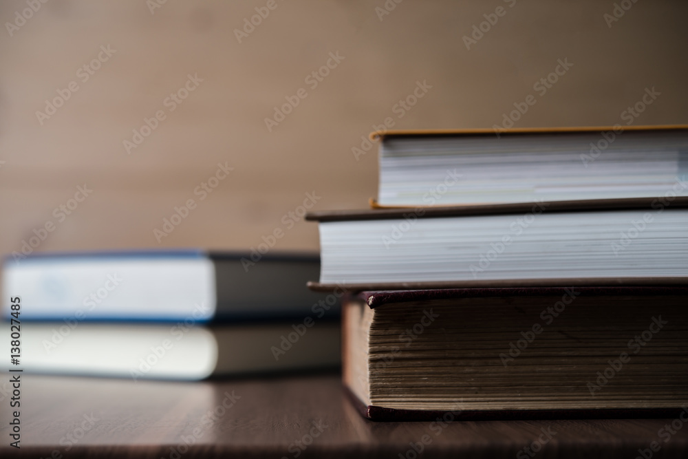 Stack of books on wooden table. Education concept. Stack of books on wooden table. Education concept.