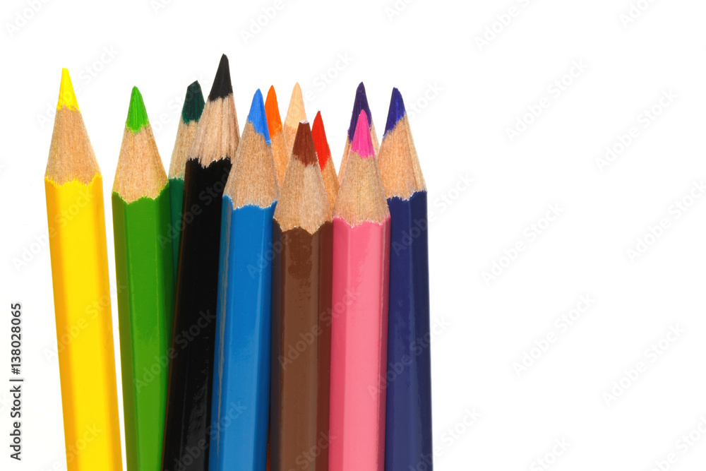 Close-up color pencils isolated on white background, concept of art and education. Close-up color pencils isolated on white background, concept of art and education.