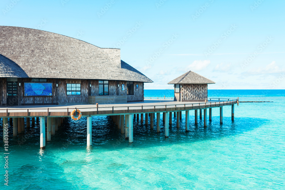 beautiful tropical sea with wood house in blue sky