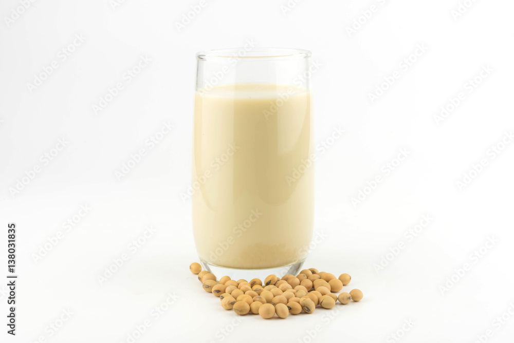soy milk with soy beans on white background soy milk with soy beans on white background