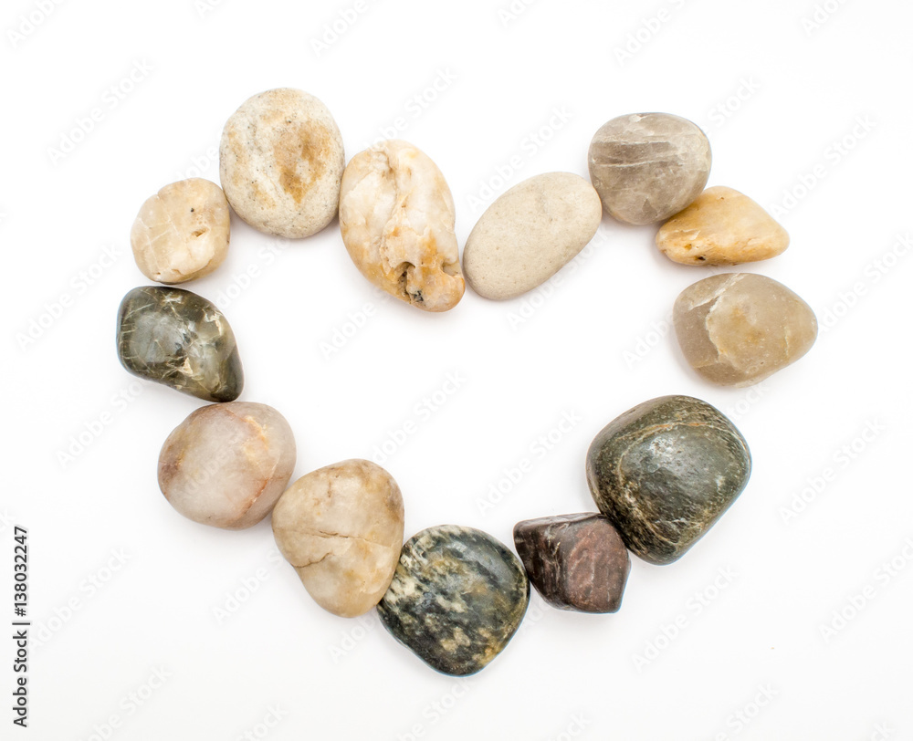 Pebbles arranged in heart shape, isolated, Valentine's Day Concept