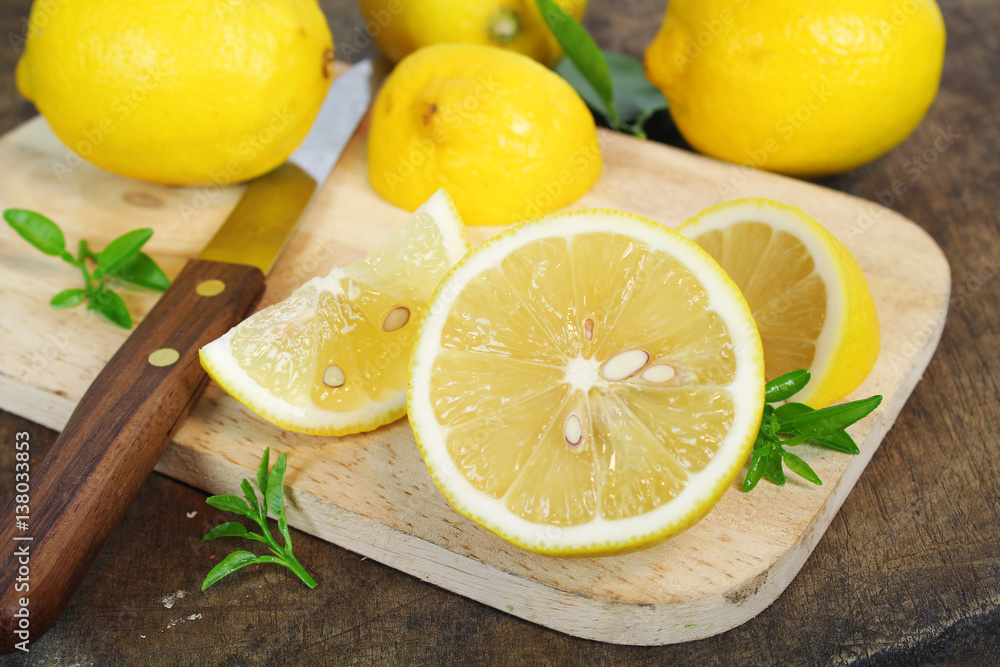 fresh lemon whole and slice with lemon leaf fresh lemon whole and slice with lemon leaf