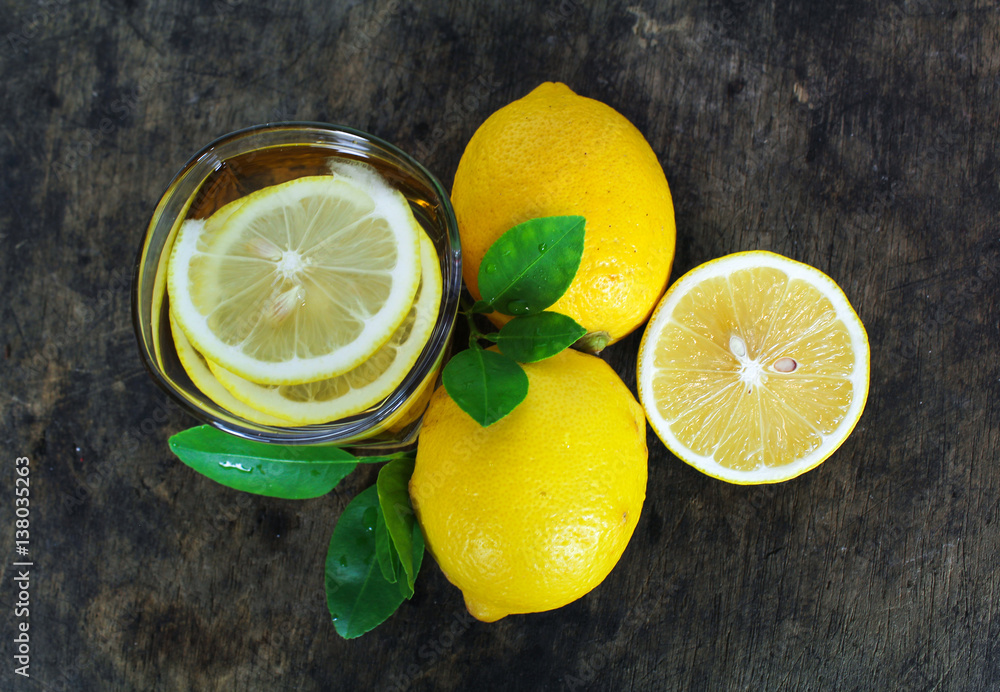 fresh lemon whole and slice with lemon leaf fresh lemon whole and slice with lemon leaf