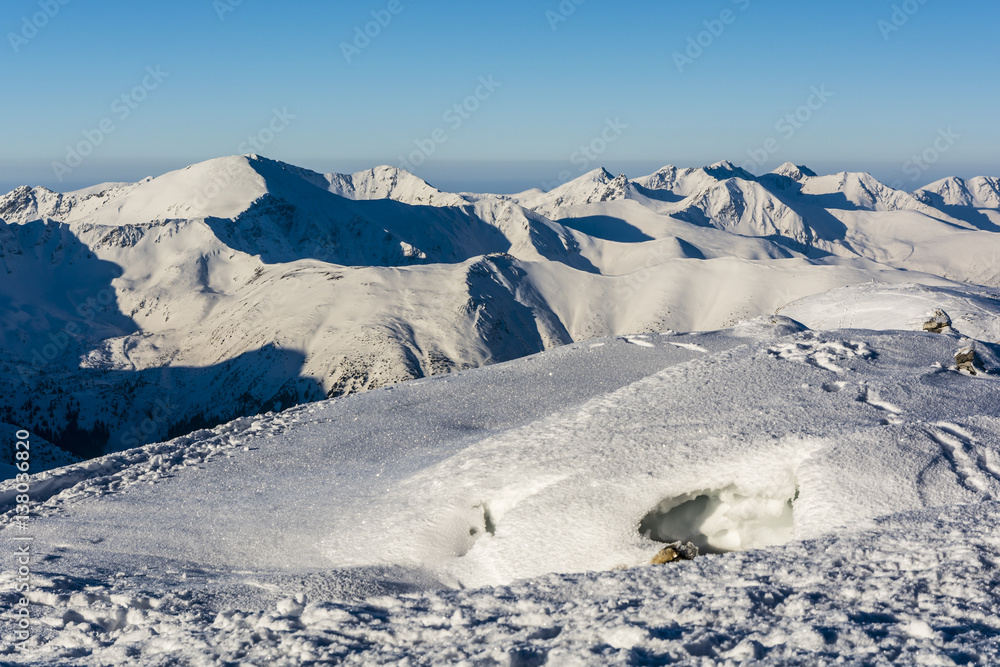 Winter landscape of mountain peaks.