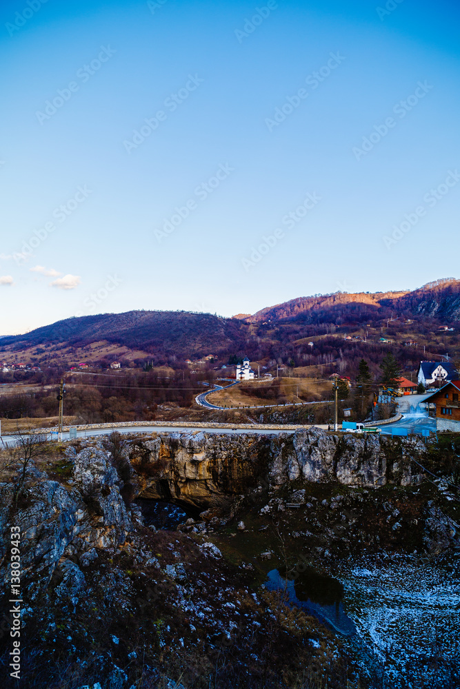 Naklejka premium landscape with God's Bridge, a natural bridge in Romania