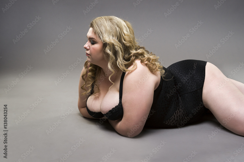 Young Beautiful Blonde Plus Size Model With Big Natural Breasts In Underwear,  Xxl Woman In Lingerie On Gray Studio Background Stock Photo, Picture and  Royalty Free Image. Image 72437069.