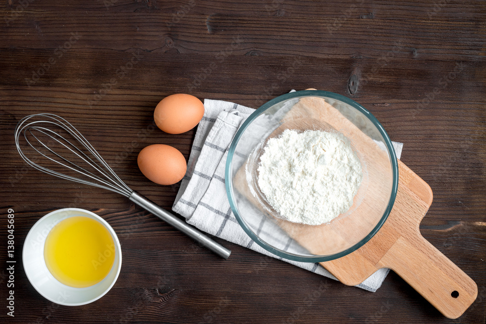 cooking pancake on wooden background top view ingredients for making cooking pancake on wooden background top view ingredients for making