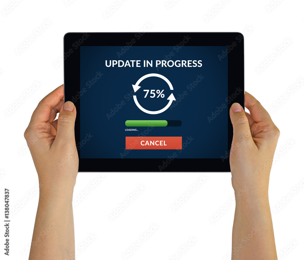 Hands holding digital tablet computer with update concept on screen. Isolated on white. All screen content is designed by me Hands holding digital tablet computer with update concept on screen. Isolated on white. All screen content is designed by me