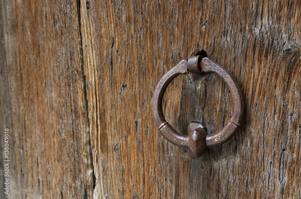 hand door knocker in old door hand door knocker in old door