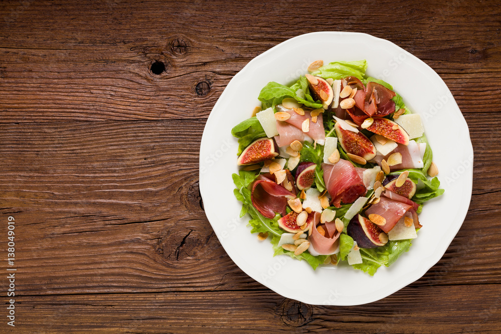 Fresh salad with figs and prosciutto. Fresh salad with figs and prosciutto.