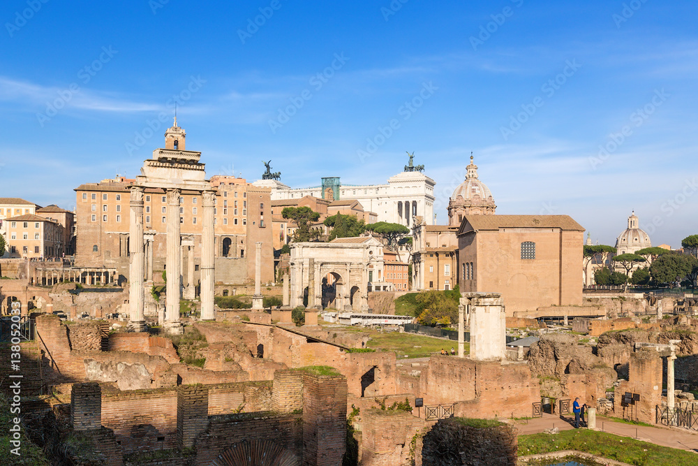 Rome, Italy. From left to right: Temple of Castor and Pollux, Temple of Saturn, Tabularium (Senators Palace), Arch of Septimius Severus, Mamertinum, Temple of Vesta, Curia Julia