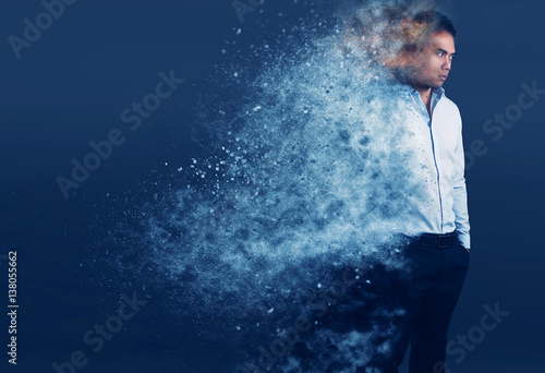jeune homme élégant avec un effet de dispersion de particules photo