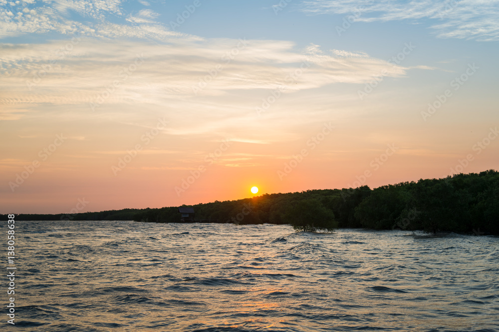 Naklejka premium Sunset / sunrise with clouds, Colorful Clouds over tropical sea.