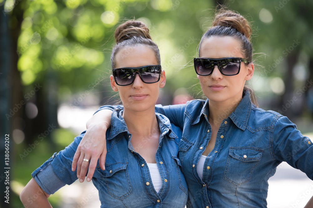 twin sister with sunglasses twin sister with sunglasses