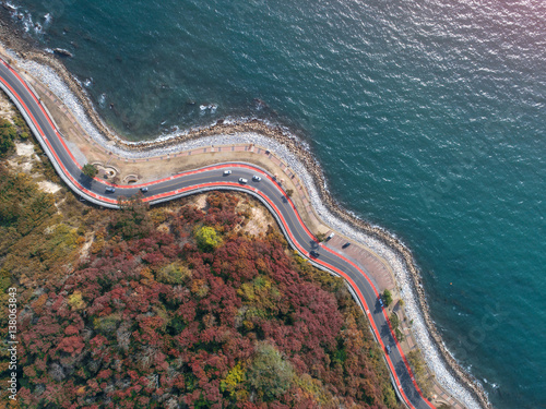 Road laying along the sea at the edge of hill