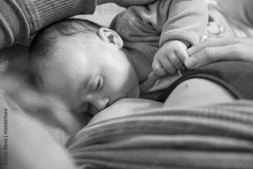 Mother breastfeeding a newborn baby boy BW Mother breastfeeding a newborn baby boy BW