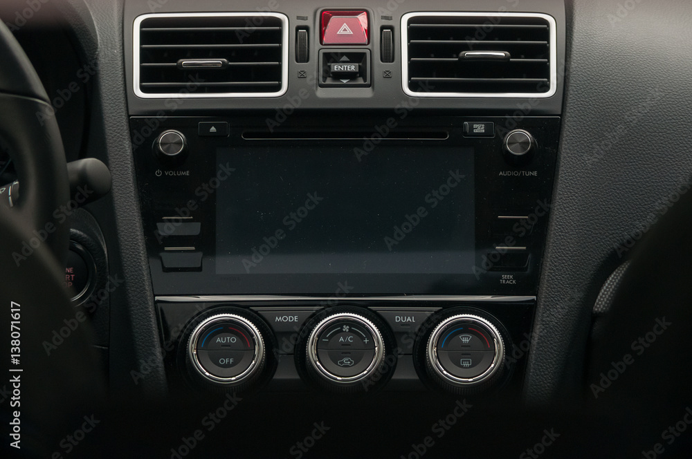 Display, climate control and air vents in the car. Display, climate control and air vents in the car.