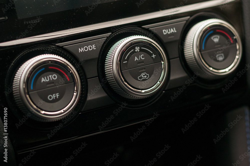 Fototapeta premium Climate control unit in the new car.