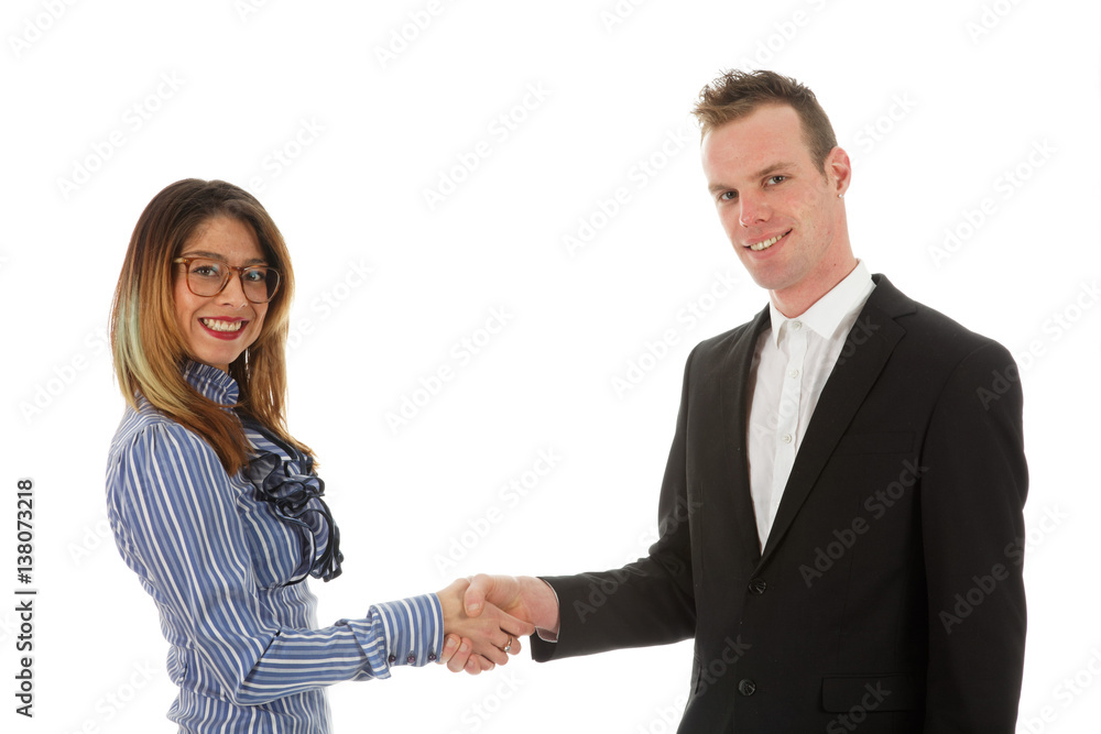 businessman and beautiful businesswoman shake hands smiling looking at you businessman and beautiful businesswoman shake hands smiling looking at you