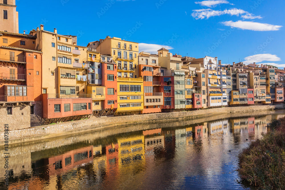 Colorful houses of Girona reflecting in Onyar River. Spain.