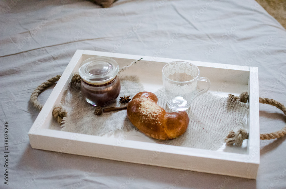 A tray with a romantic delicious breakfast A tray with a romantic delicious breakfast