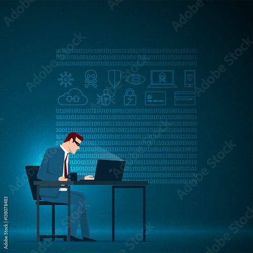 The masked businessman is working with the computer.