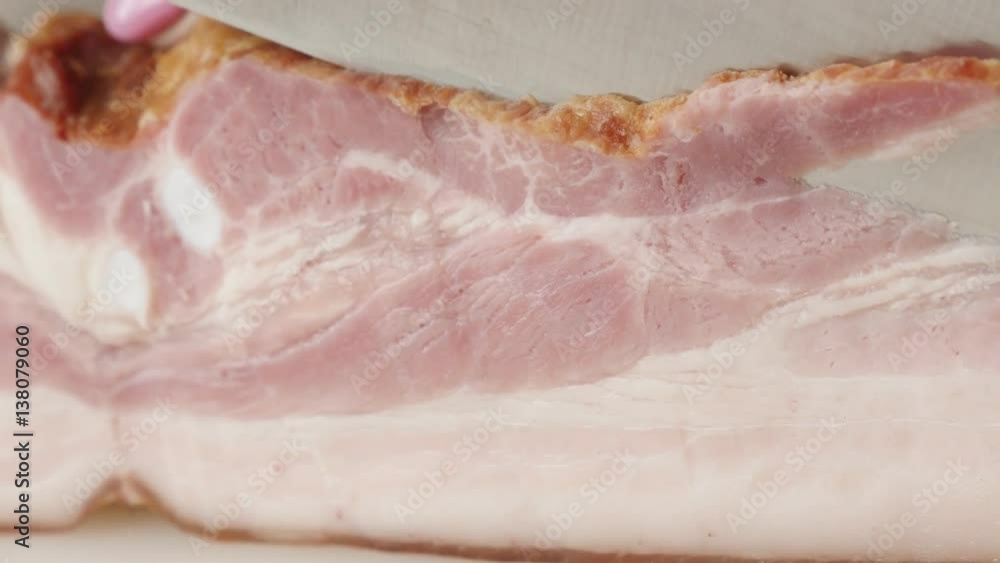 Cutting slices of cured bacon tasty food shallow DOF 4K 2160p 30fps UltraHD footage - Woman use knife for smoked pork meat cut 3840X2160 UHD video Cutting slices of cured bacon tasty food shallow DOF 4K 2160p 30fps UltraHD footage - Woman use knife for smoked pork meat cut 3840X2160 UHD video