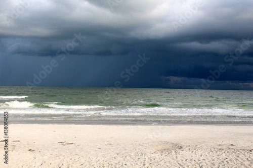 The white and dark clouds over the sea.