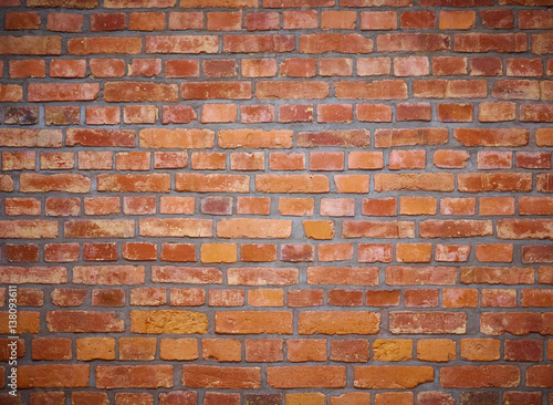 Old red brick wall for background