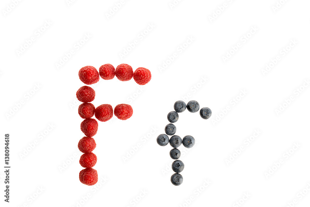 Alphabet from fresh fruit, raspberry and blackberry Alphabet from fresh fruit, raspberry and blackberry