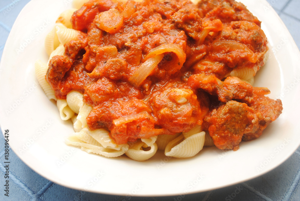 Pasta Shells Served with Chunky Meat Sauce Pasta Shells Served with Chunky Meat Sauce