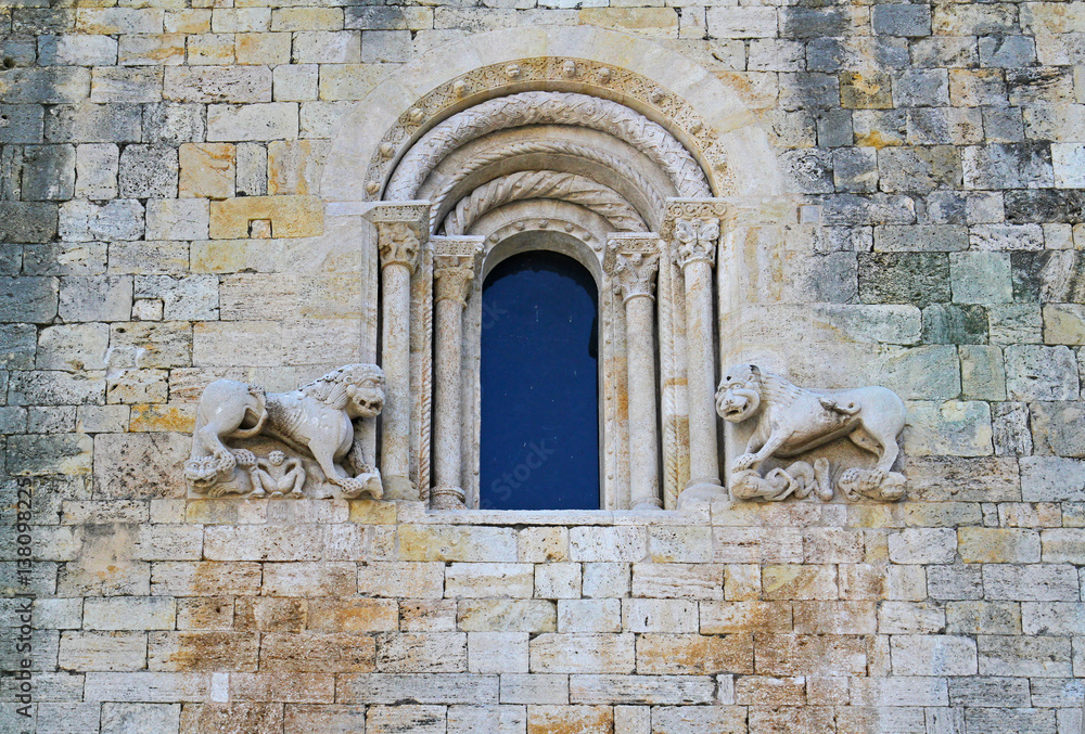 Naklejka premium Window with lions of old building in Besalu (Catalonia, Spain)