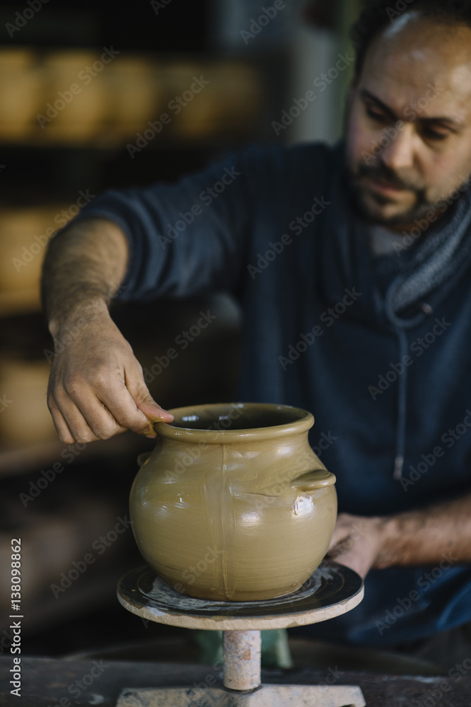 man that works in the factory of pottery man that works in the factory of pottery