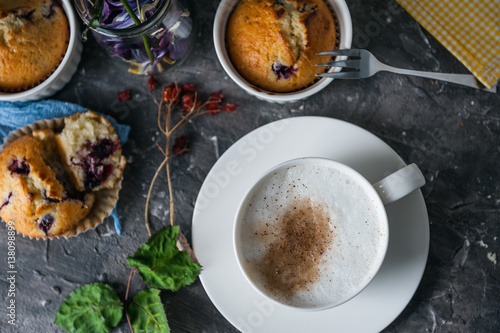 spring breakfast with muffins in rustic style