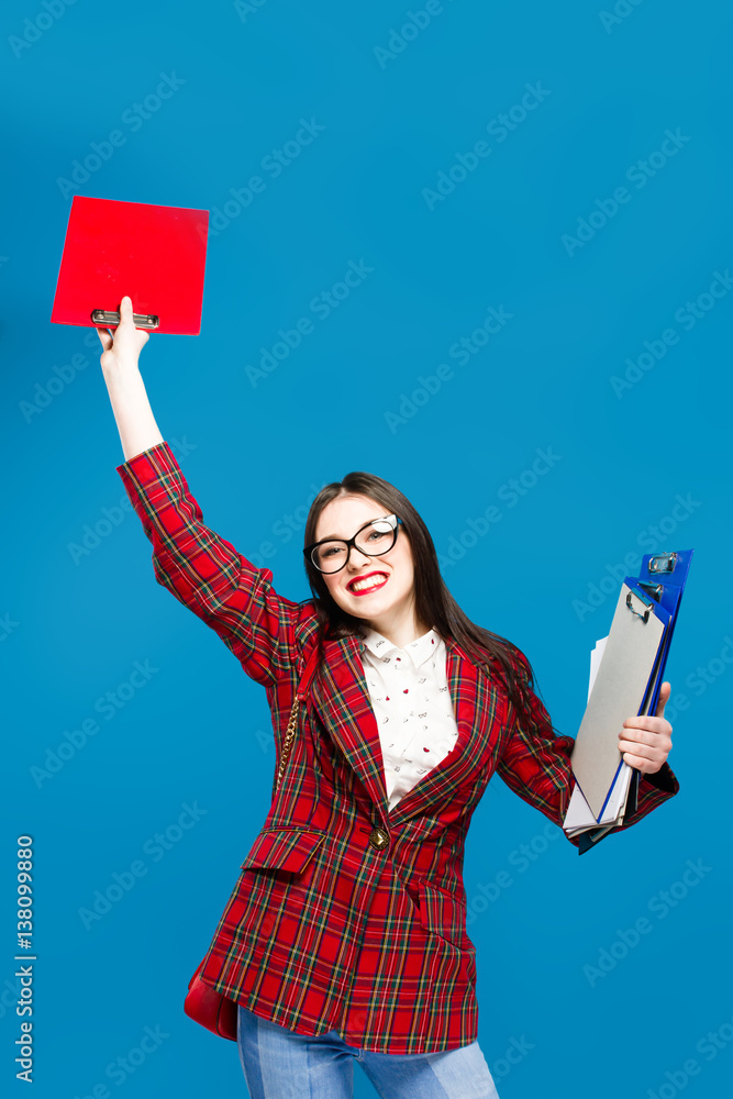 education and people concept - smiling female student in eyeglasses with bag and notebooks. Tests time education and people concept - smiling female student in eyeglasses with bag and notebooks. Tests time
